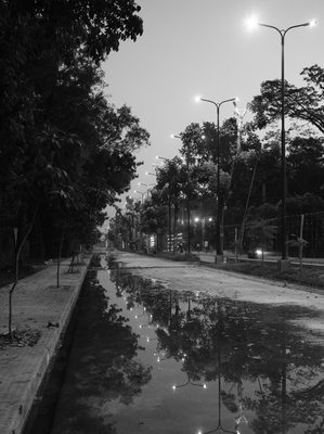 Low light, street and documentary, black and white shot on a Fujifilm X-Pro3, November 2025.